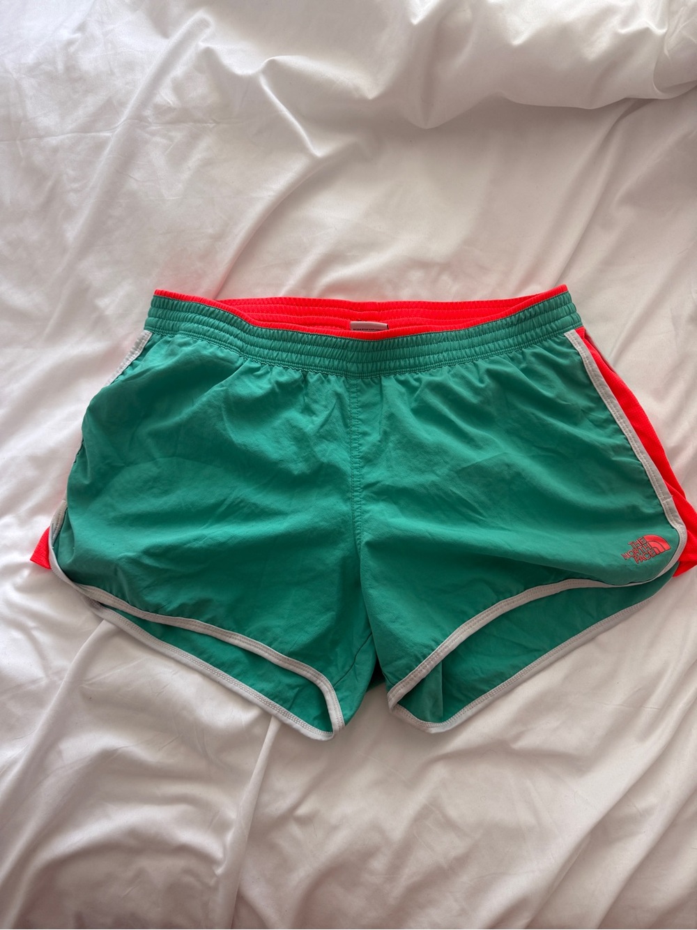 The North Face Teal and Coral Women’s Running Shorts